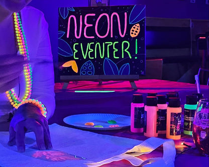 Julebord med Neon Painting – unikt bedriftsarrangement i mørket med lysende farger